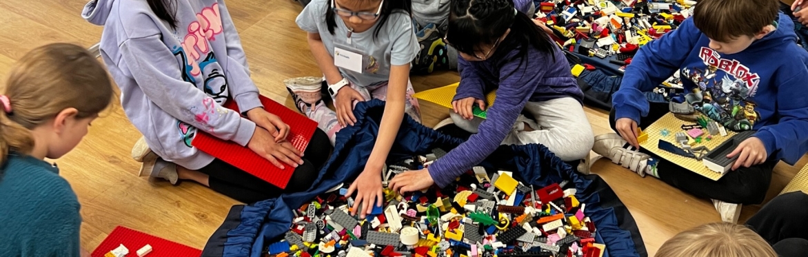 Children playing with LEGO