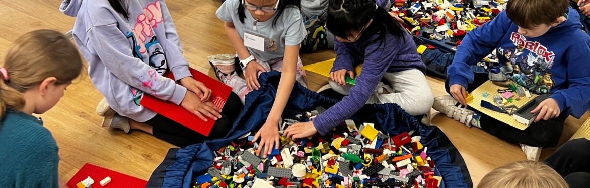 Children playing with LEGO