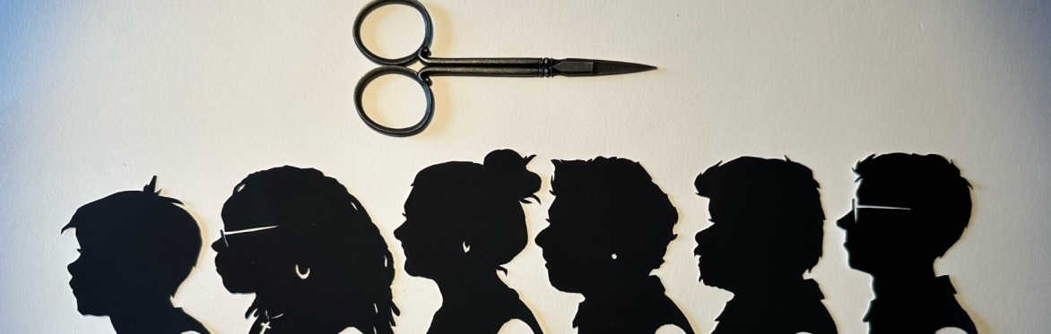 A row of black silhouettes on a white piece of paper.