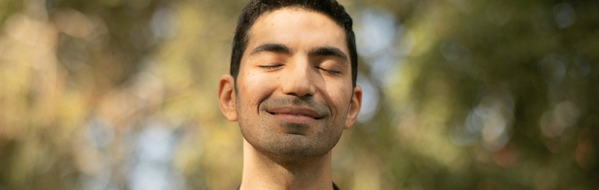 https://unsplash.com/photos/a-man-with-his-eyes-closed-standing-in-front-of-trees-9cKXFH5Ll3Y?utm_source=unsplash&utm_medium=referral&utm_content=creditShareLink