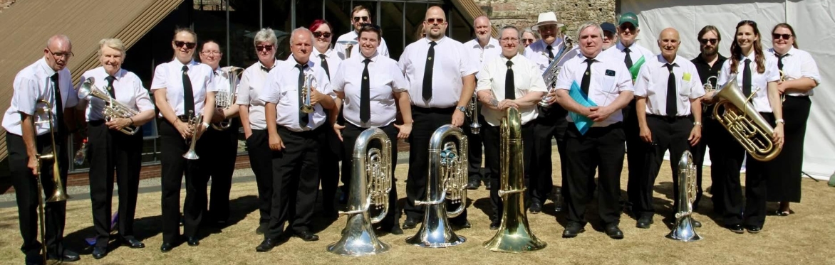 Florence Brass all lined up after performing at Ironbridge