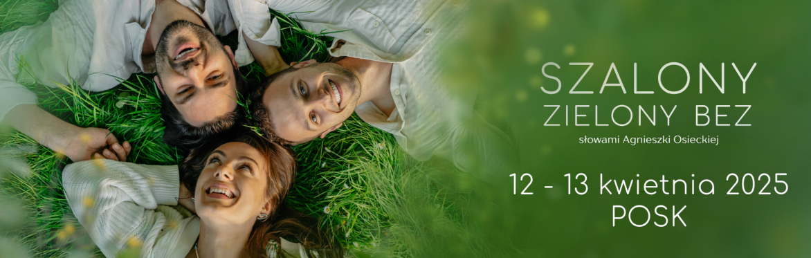 Three people smile while lying on the grass in spring.