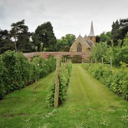 The walled garden view towards All Saints Church Brocklesby
