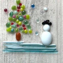 glass snowman and tree scene