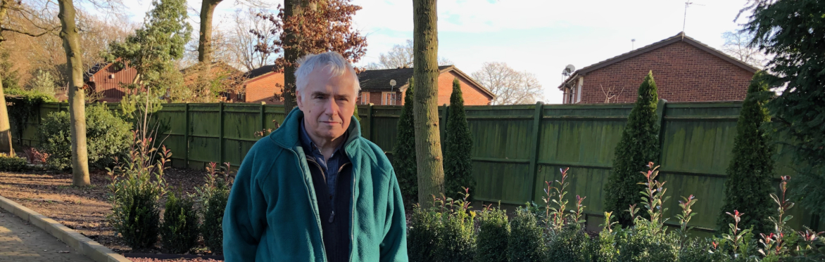 Tim Maude in a garden