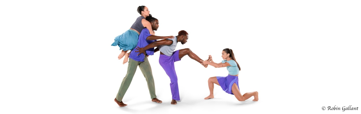 Four dancers dancing in purples and blues