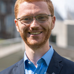 Ross Greer MSP in front of the Scottish Parliamen (credit: Scottish Greens)