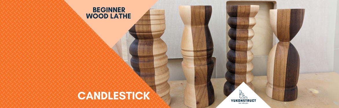 An image of the type of candlestick produced in the workshop with associated branding.
