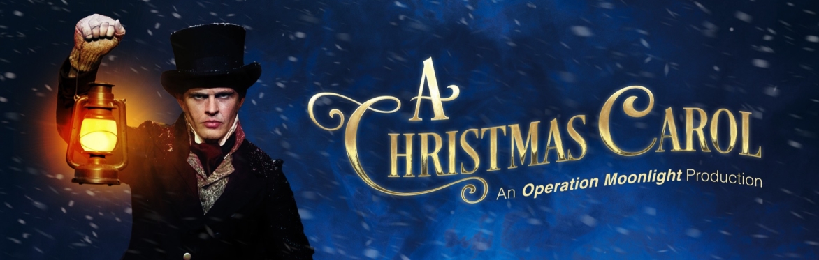 A Victorian gentleman holds a lantern up; he is staring through the snow with a pensive expression. The title A Christmas Carol is written in cursive gold type next to him.