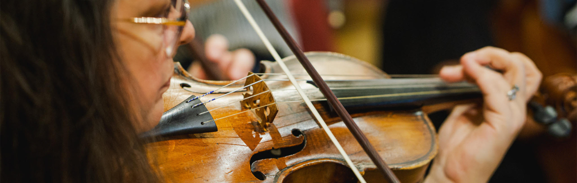 Naomi playing violin