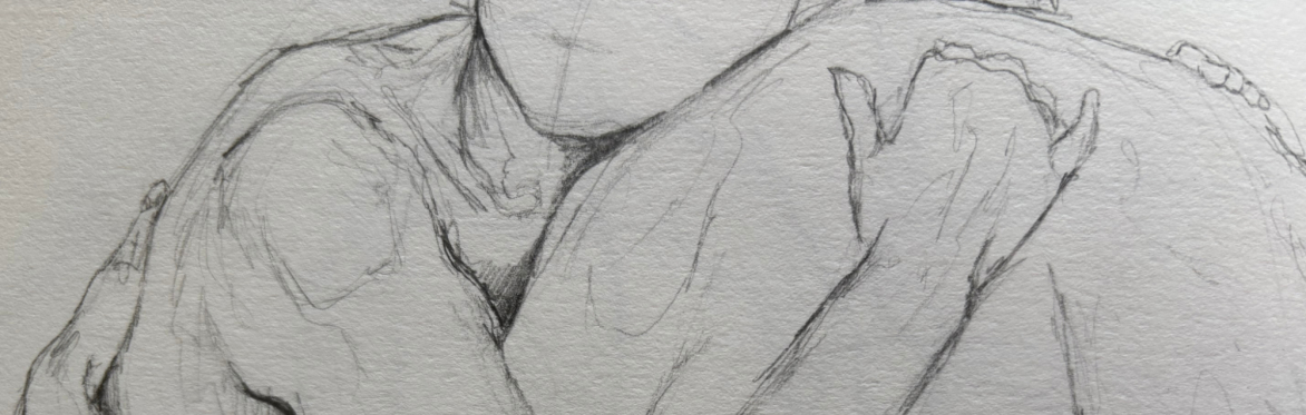 Drawing on a pad with various pencils on a purple, dark green and orange background