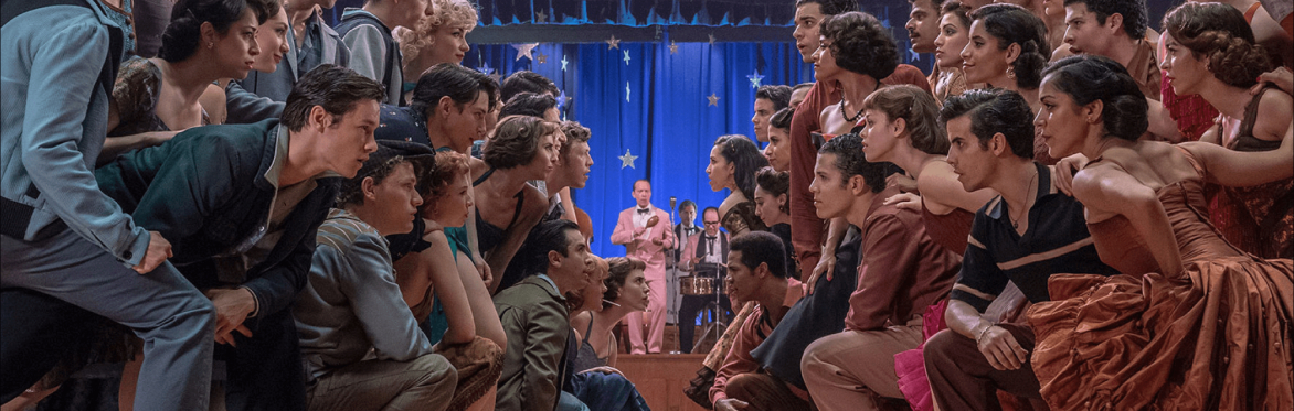 A still from the remake of West Side Story featuring the cast at a high school dance