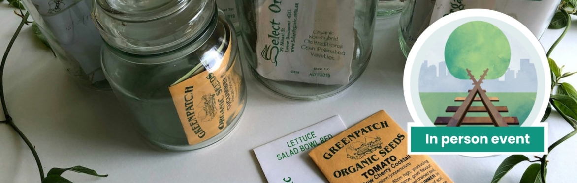 Seed packets and seeds in jars