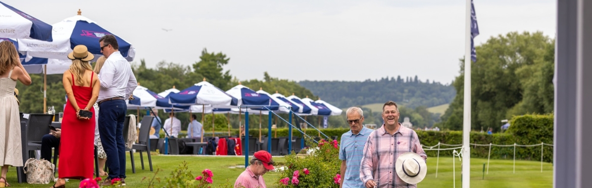 Blue and white umbrellas in the Chairman's Enclosure