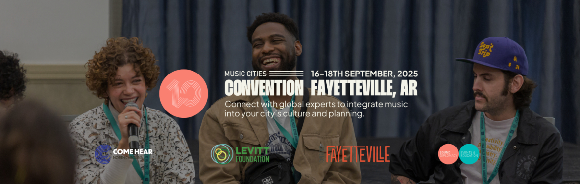 Music advocates having an exciting conversation at the music cities convention