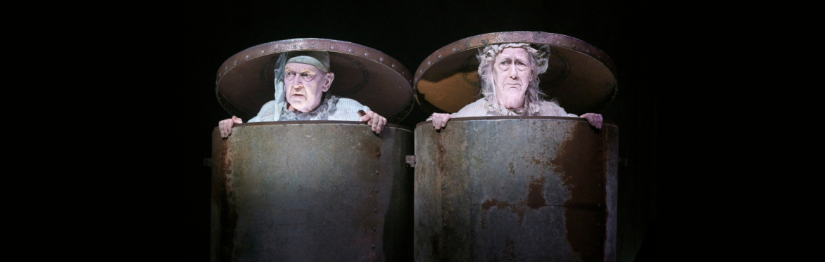 Endgame production image: A man and a woman in two trash cans