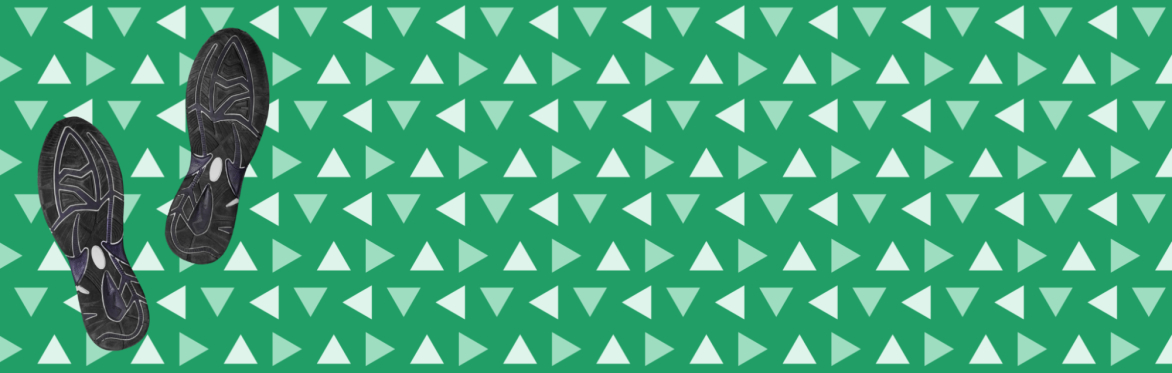 A pair of black footprints on a green background with triangle pattern