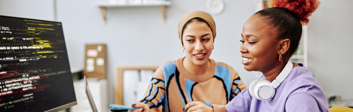 a young woman being supported by a mentor