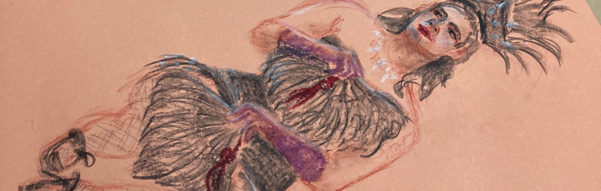 Drawing on a pad with various pencils on a purple, dark green and orange background