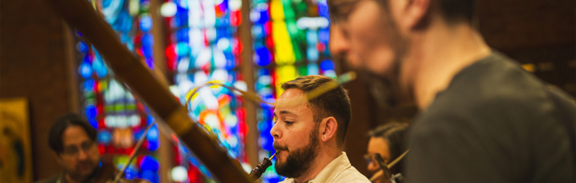 Matthew playing oboe and Dave playing bassoon in Trinity Cathedral