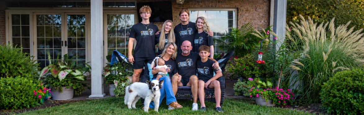 Mike Skaggs with his family, showing support in their #SKAGGSSTRONG shirts.