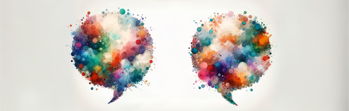 Abstract artwork featuring two speech bubble shapes of vibrant watercolor dots in a range of sizes and hues including red, orange, blue, and green, on a soft white background, giving the impression of