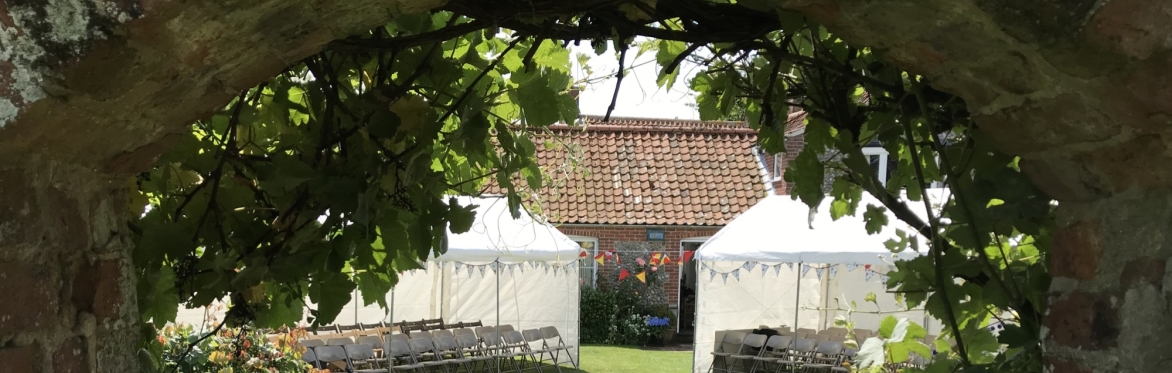 View of the garden with marquees