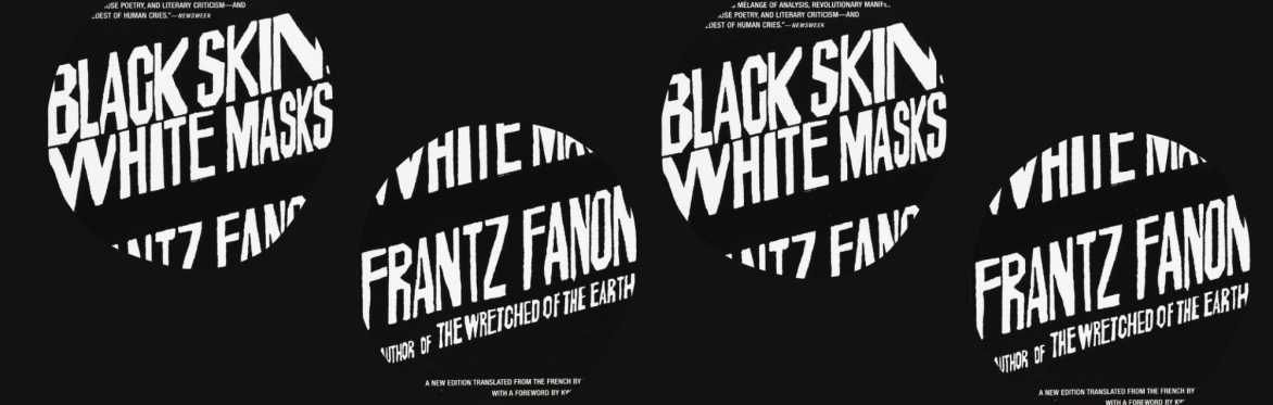 The book cover of Frantz Fanon's Black Skin, White Masks. The text is written in white against a black background.