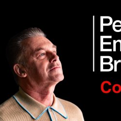 A white man looking at text which says People's Emergency Briefing Community Screening