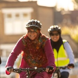 Two people cycling