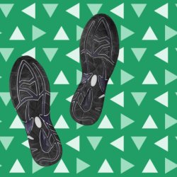 A pair of black footprints on a green background with triangle pattern