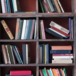 old wooden bookshelves with books a various angles