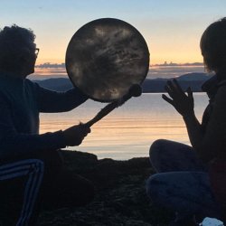 two people at sunset