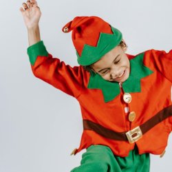 Boy dancing dressed as elf