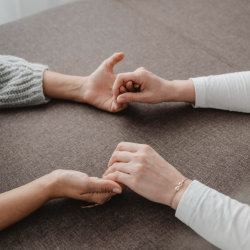 two people holding hands