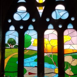 Part of the stained glass window at HH United Reformed church