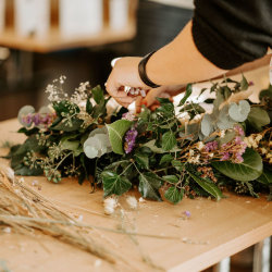 A work in progress Christmas wreath being made.