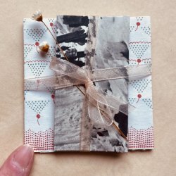 Made in east lothian workshop image bookbinding tiny handmade book for sketching, notes and secrets with finger for scale