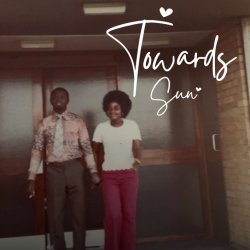 Image is promotional poster of woman with Afro, a white top and pink trousers holding her partners hand.
