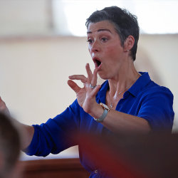 Rebecca Lodge-Birkebaek conducting the Sunflower Singers community choir at the JAM Festival.