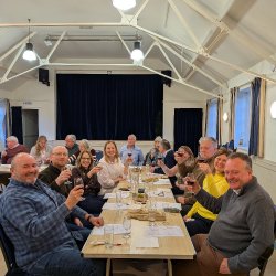 Guests enjoy work at a York Wines event