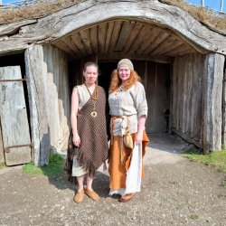 Two of our heritage textile tutors in prehistoric outfits