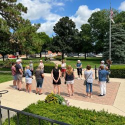 A docent giving a guided history tour of Cook Park in Libertyville, IL.