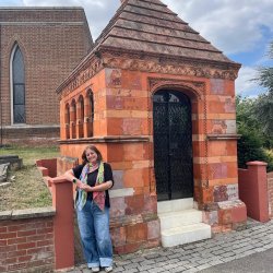 Em stands by Henry Tate's mausoleum