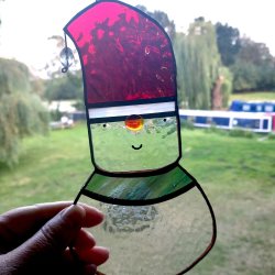 A stained glass, copper foiled stained glass window hanging.