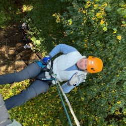 Image of a person abseiling over a viaduct.