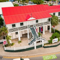 Cayman Islands Museum, red roof with white timber.