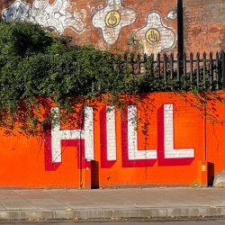 The word HILL on a wall