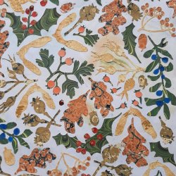 A paper collage of autumn leaves and berries created from marbled papers