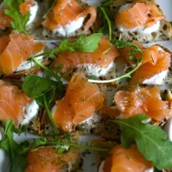 A platter of smoked salmon canapes ready to eat.